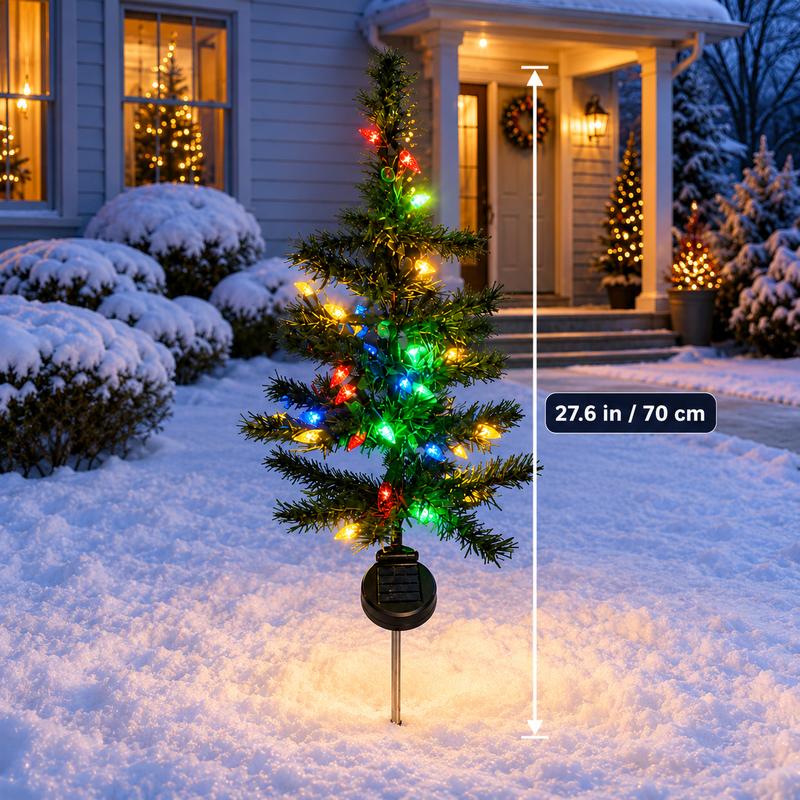 Multicolor strawberry-shaped bulbs glowing on solar Christmas pathway trees