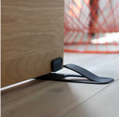 Door stopper holding a door open