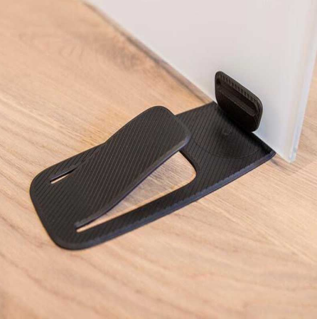 Door stopper under a white door